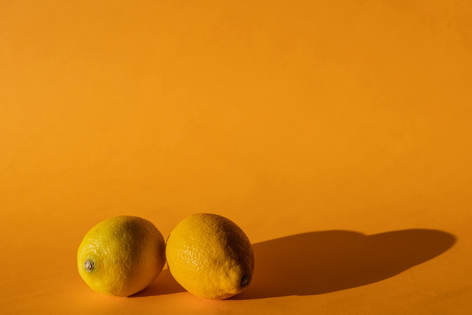 Bright yellow lemons arranged on a sunny background, symbolizing the patient, natural rhythm of slower arousal